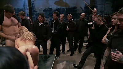 Flexible Blonde Gets Bound and Fucked for the Crowd